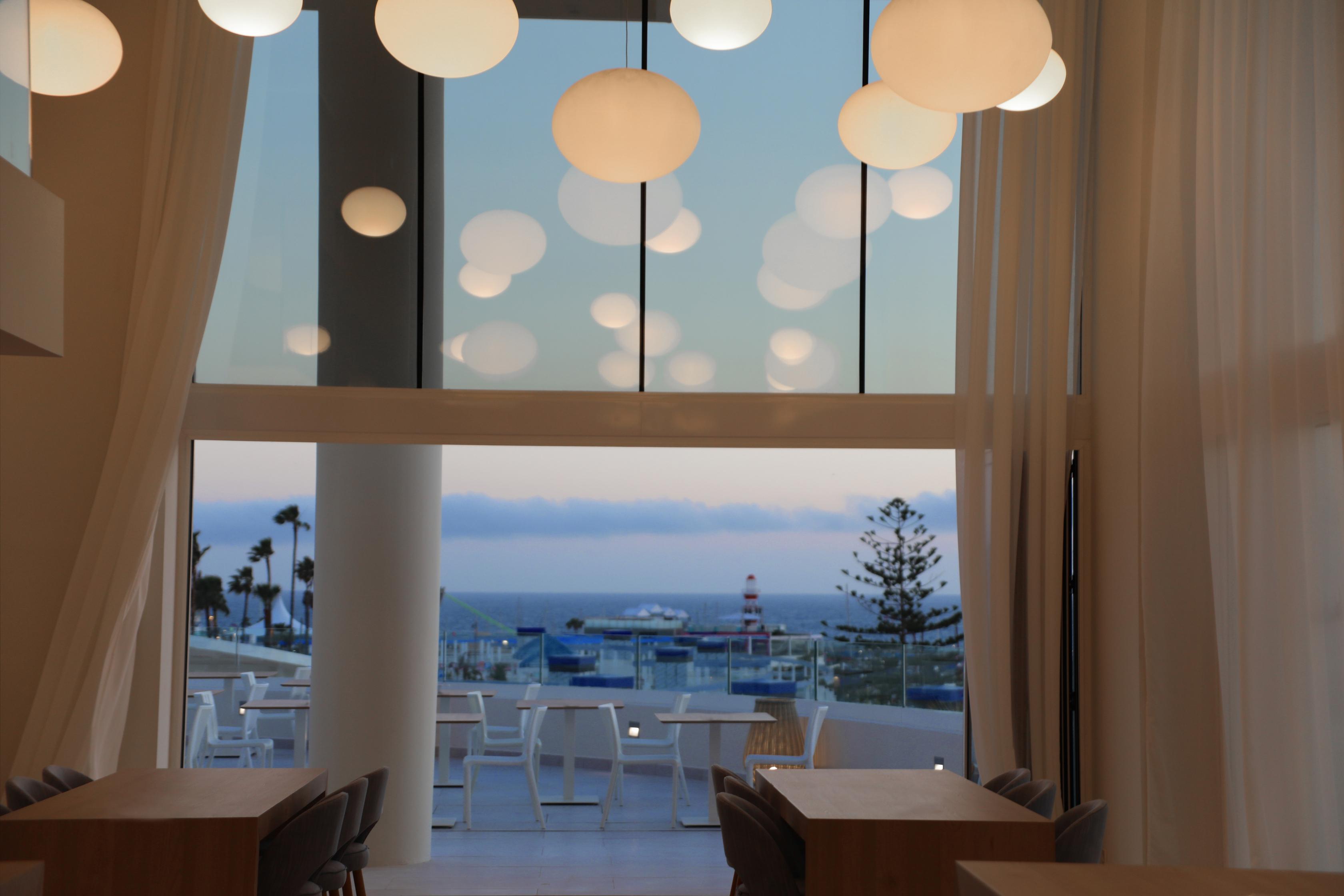 ホテル イベロスター セレクション サビラ アデヘ エクステリア 写真 The interior of the restaurant